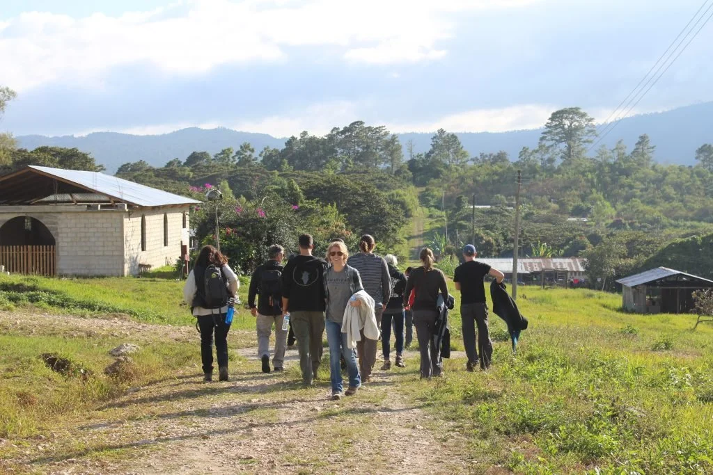 An On the Ground delegation visiting a partner coffee cooperative